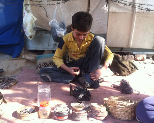 Pathan_cobbler_in_his_workspace